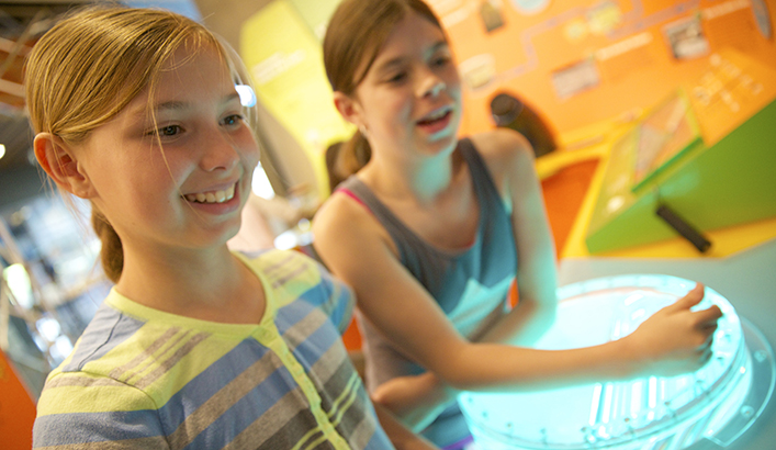 Girls in the LOTT Wet Center exhibit gallery in Olympia, WA.