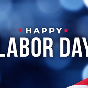 red, white and blue banner that says Happy Labor Day.